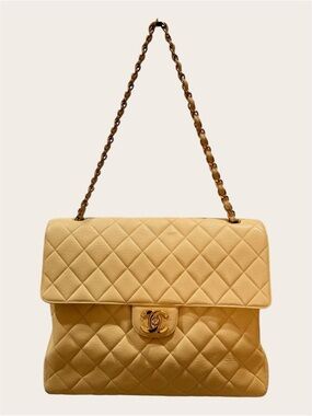 CHANEL Quilted Shoulder Bag in Pale Yellow with Gold Chain